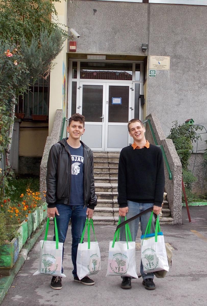 Nino and Etienne deliver books and supplies to the orphanage
