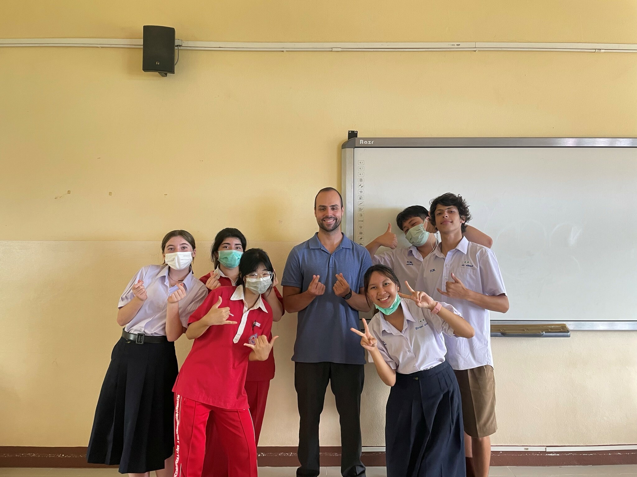 Carsyn poses with her classmates at her host school in Thailand