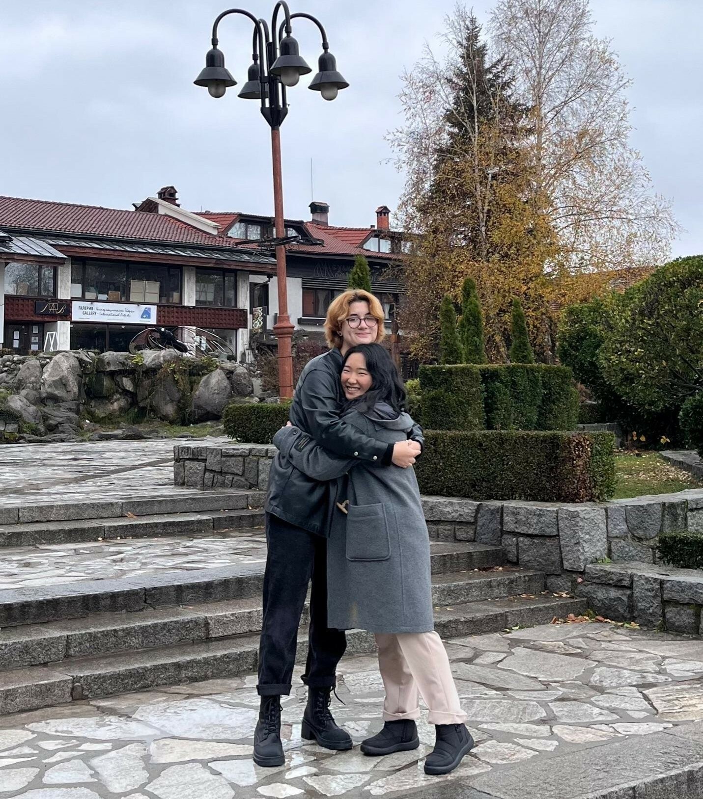 Emi Hugging a Friend