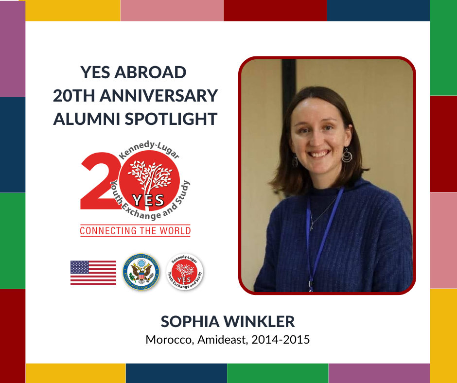 A portrait of Sophia smiling within a YES Abroad 20th anniversary icon