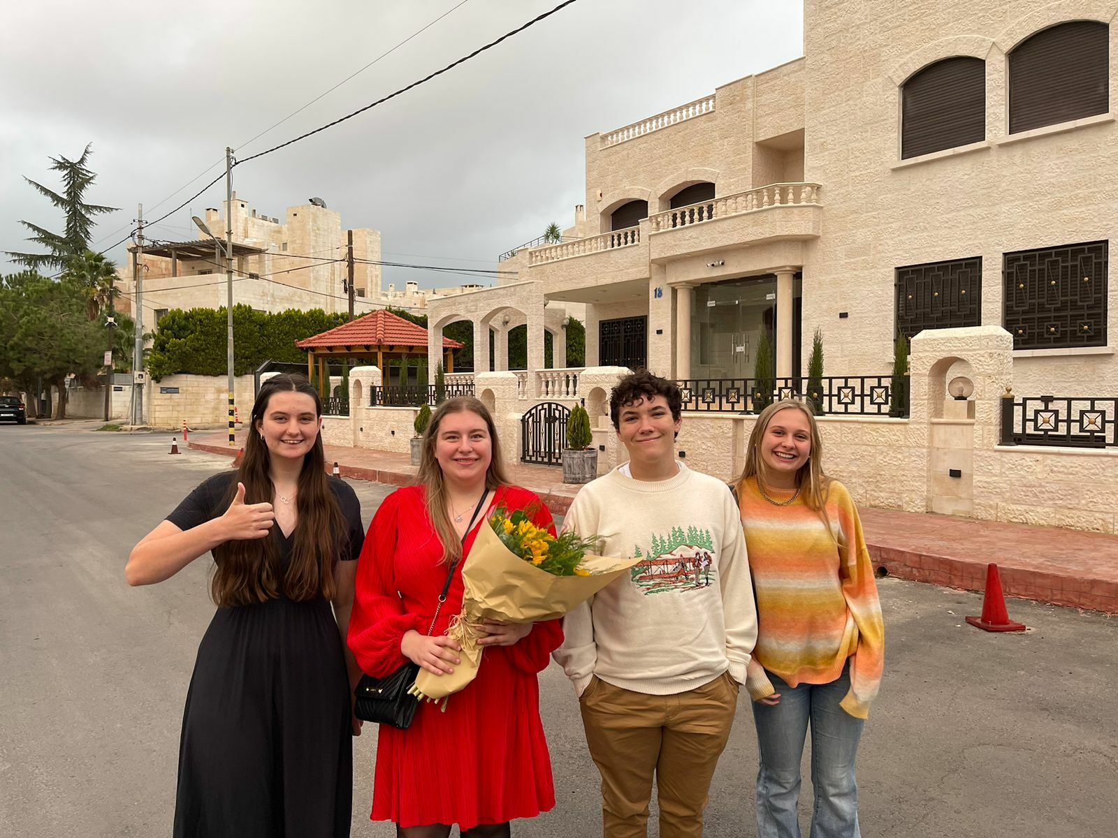 Jordan Students Outside With Flowers