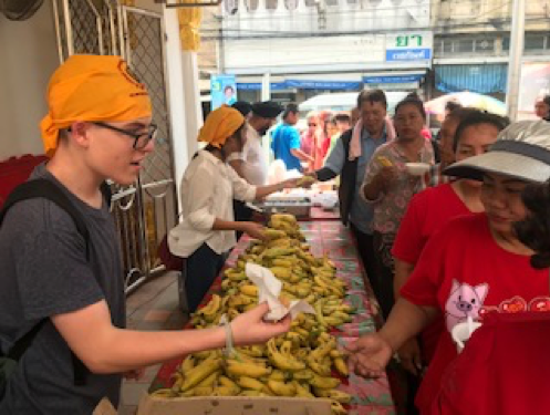 Luke Handing Out Food