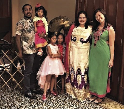 Mas Russell Montana With Entire Host Family At Celebration