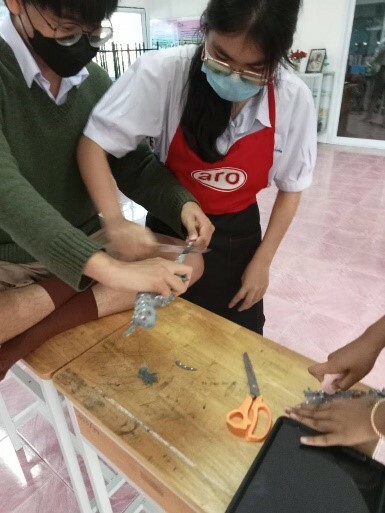 Two students crafting together