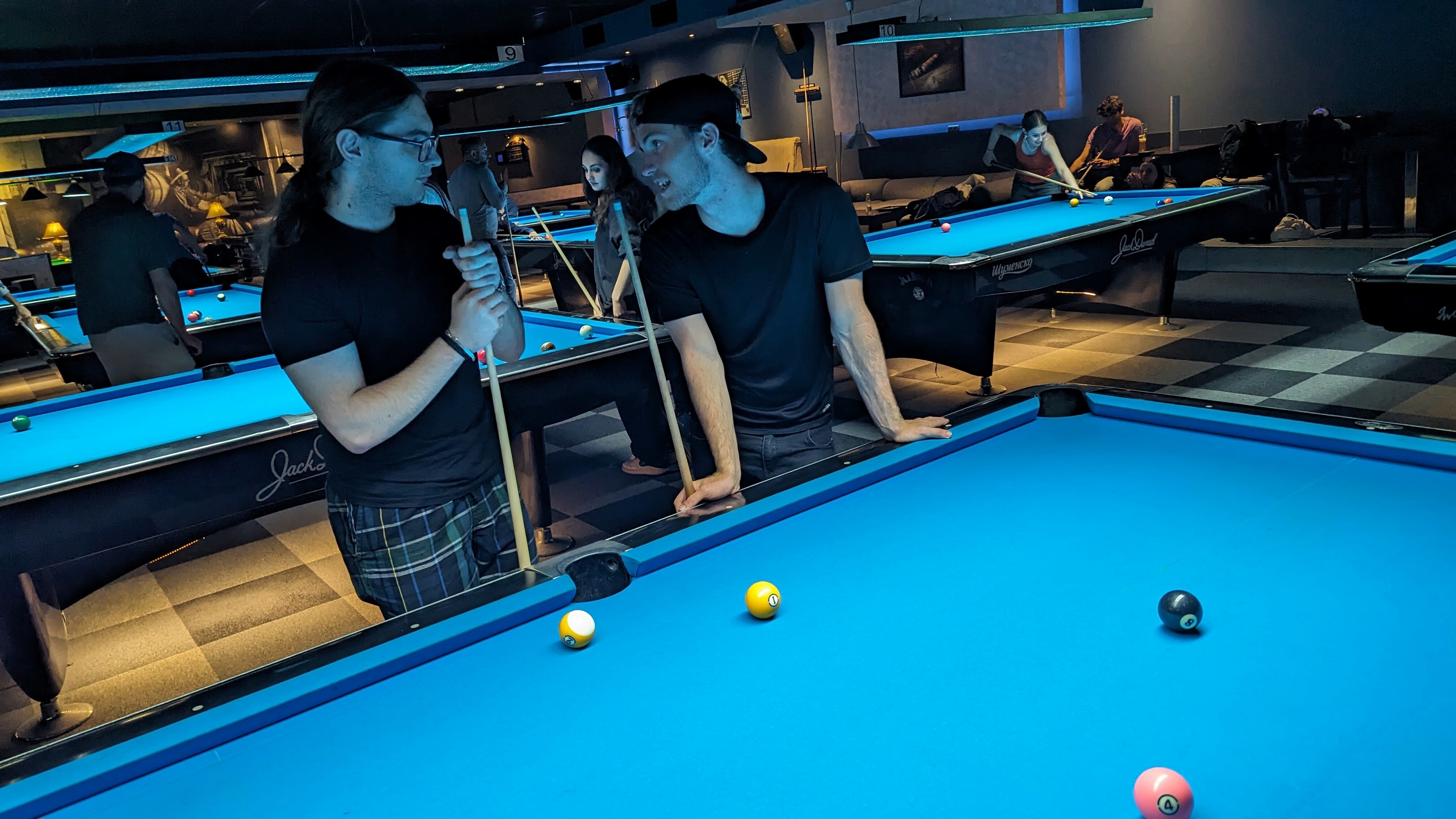 Photo of Jake playing pool