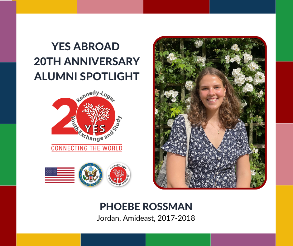 Phoebe smiling in front of flowers in a template for the YES Abroad 20th Alumni Spotlight Series