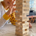 A child playing Jenga.