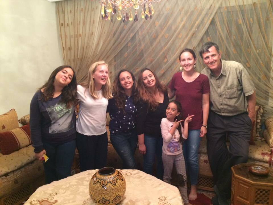 Sophia with in a group picture with her host family