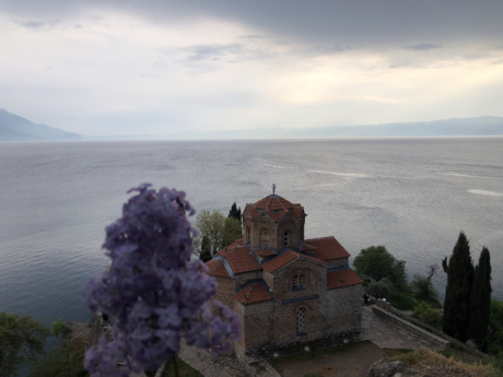 A church on a cliff overlooking the water
