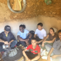 Students having tea in the countryside